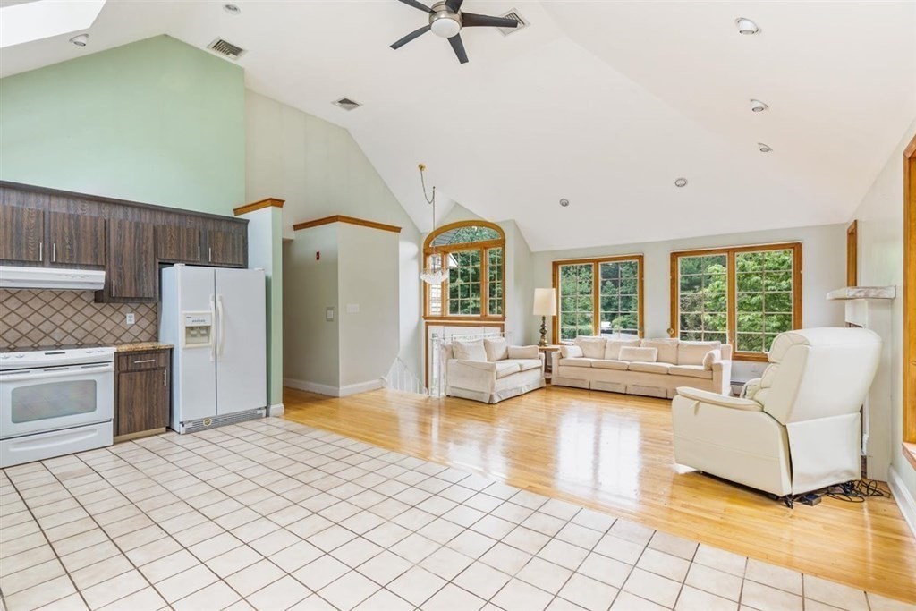 17 Brentwood Road Kingston, MA 02364 - Photo 8 of 33 a living room with furniture and a fireplace
