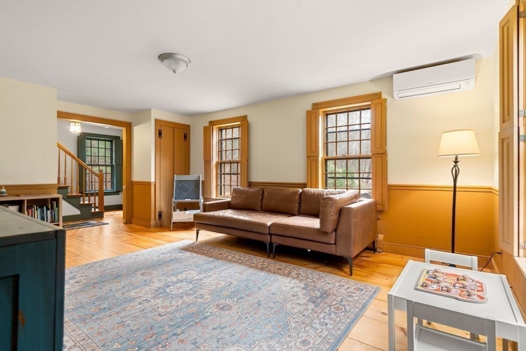 151 Spofford Road Boxford, MA 01921 - Photo 14 of 42 a living room with furniture and a window