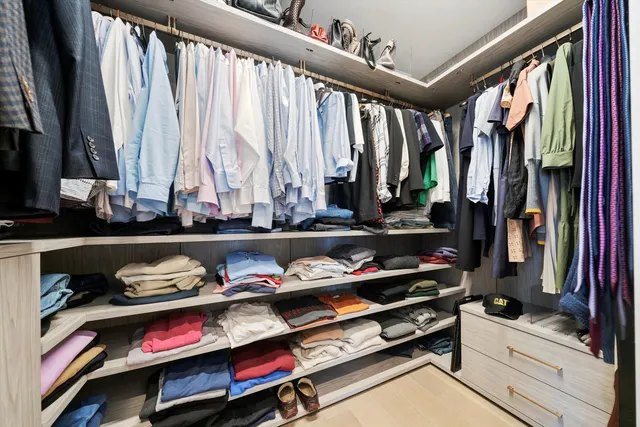 a room with lots of different colored cloths