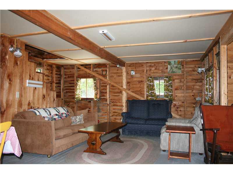 8 Shallow Shore Lane Sumner, ME 04292 - Photo 7 of 15 Living Room.