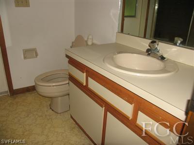 17461 Fuchsia Road Fort Myers, FL 33967 - Photo 5 of 5 a bathroom with a sink and a toilet