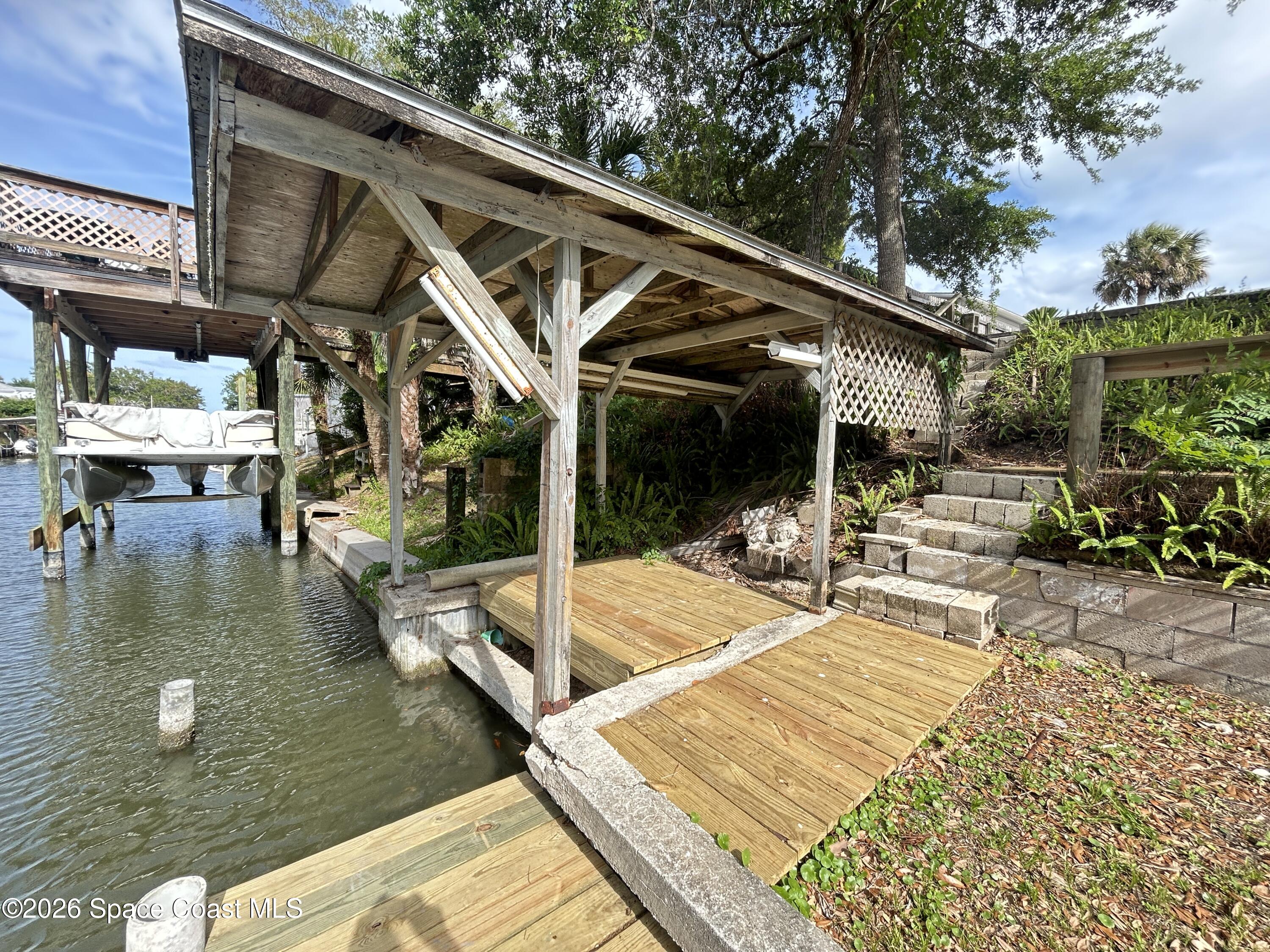 117 Lewis Street Edgewater, FL 32141 - Photo 4 of 26 a view of a swimming pool with sitting area