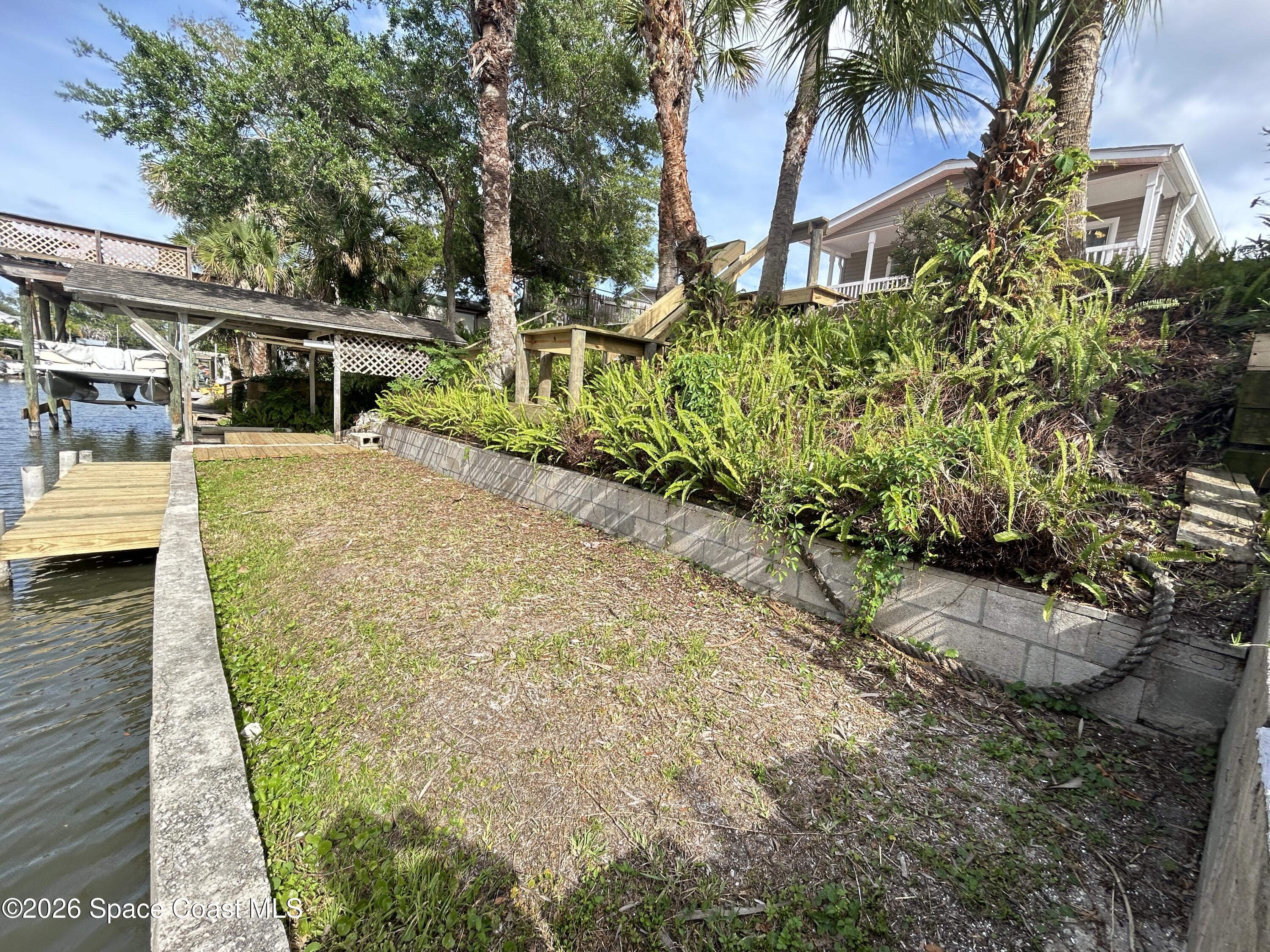 117 Lewis Street Edgewater, FL 32141 - Photo 6 of 26 a view of a backyard