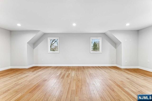 25 Jones Court Norwood, NJ 07648 - Photo 35 of 50 an empty room with wooden floor and windows