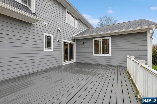 25 Jones Court Norwood, NJ 07648 - Photo 47 of 50 a view of a house with wooden deck