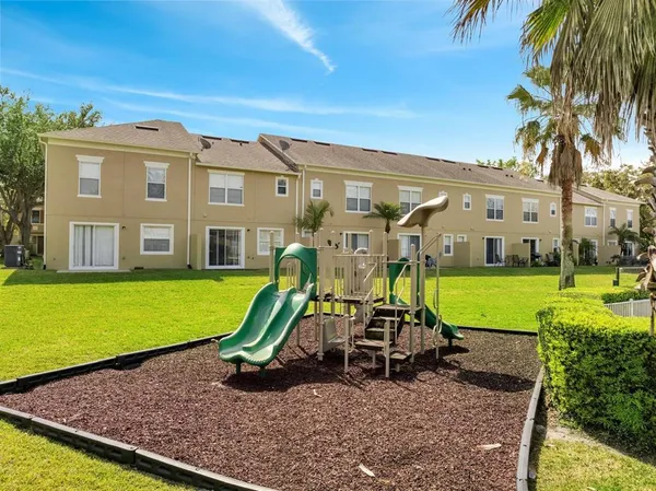 a view of a house with a swimming pool