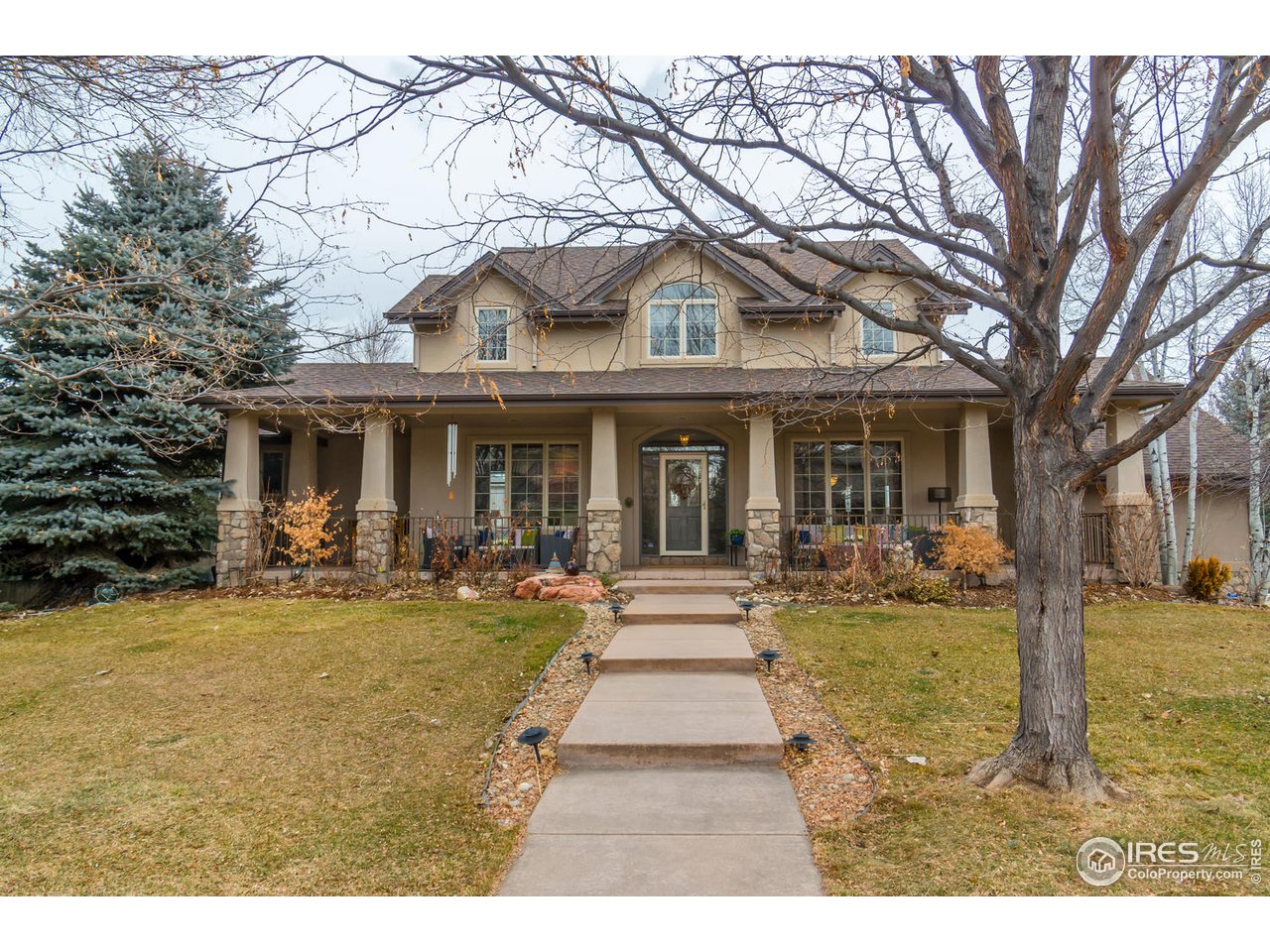 2435 Targhee Point Lafayette, CO 80026 - Photo 2 of 39 a view of a house with swimming pool and porch with furniture