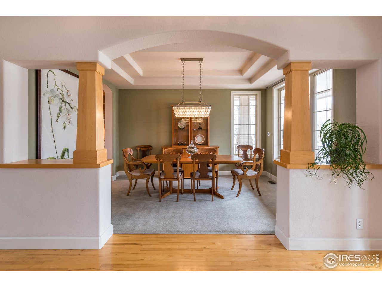 2435 Targhee Point Lafayette, CO 80026 - Photo 5 of 39 a view of a dining room with furniture window and wooden floor