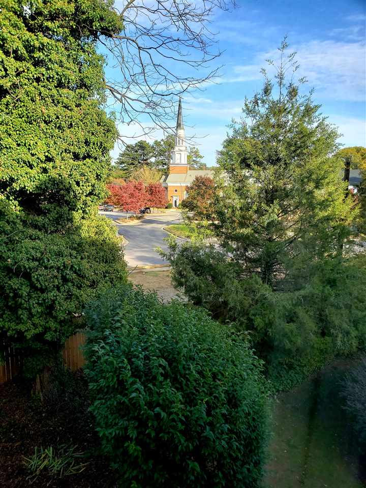1401 Governors Court Raleigh, NC 27604 - Photo 29 of 30 Beautiful view of church next door. You can hear the bells ring! Quiet neighbor! Master Bedroom