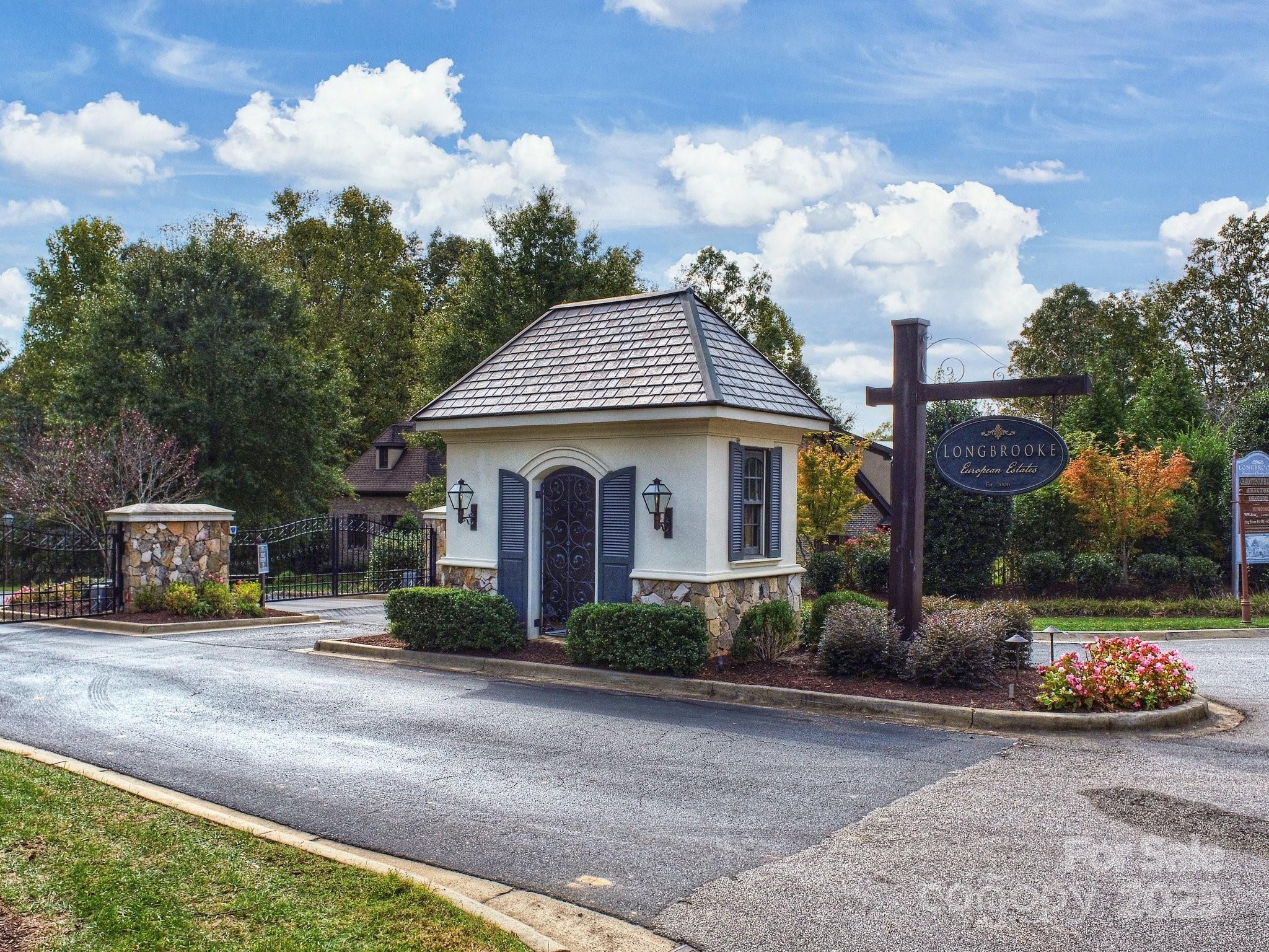 5248 Winding Grove Way, Unit 61 Fort Mill, SC 29707 - Photo 2 of 6 a front view of a house with garden