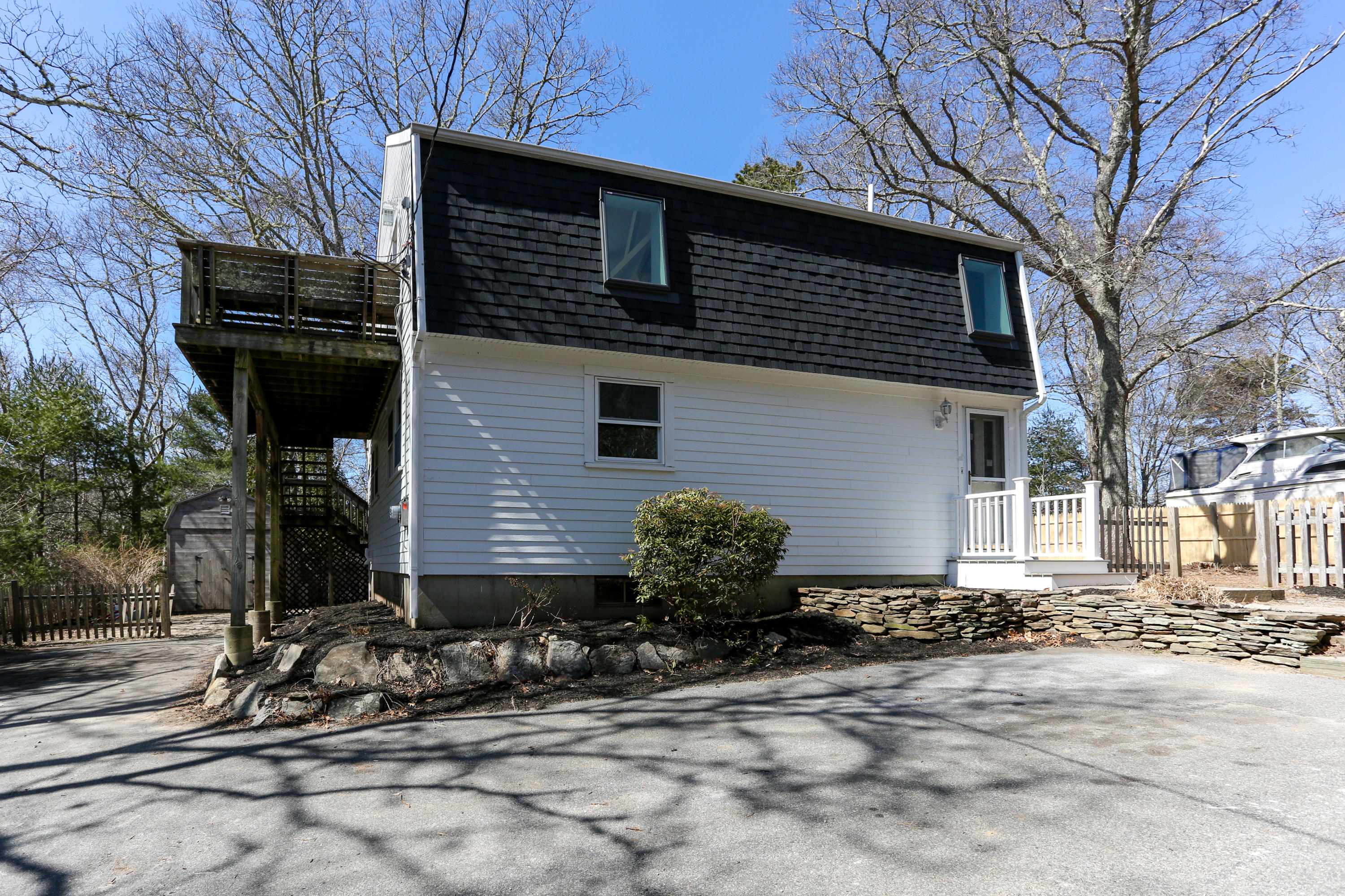 21 Cove Road Forestdale, MA 02644 - Photo 1 of 29 a front view of a house with garden