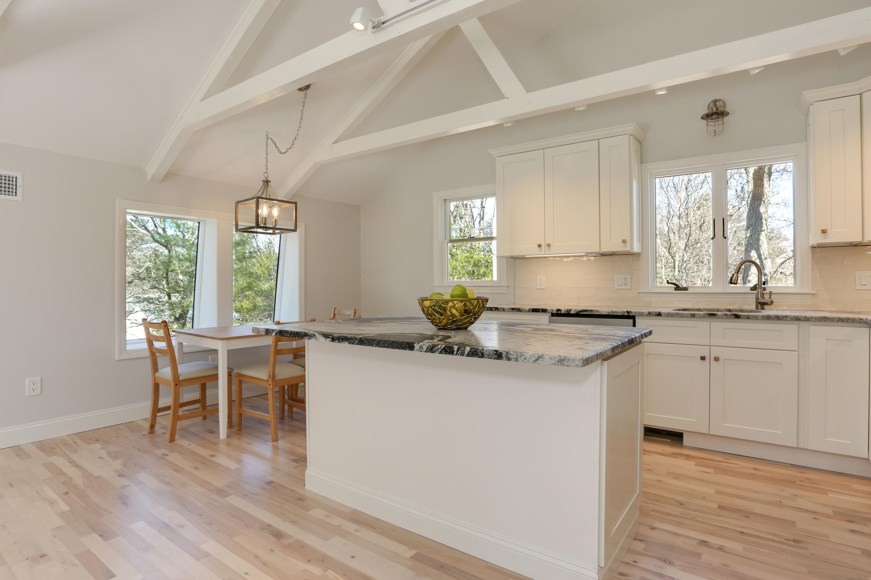 21 Cove Road Forestdale, MA 02644 - Photo 8 of 29 a kitchen with granite countertop a sink cabinets and window