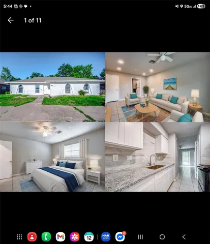 a view of kitchen with kitchen island and living room