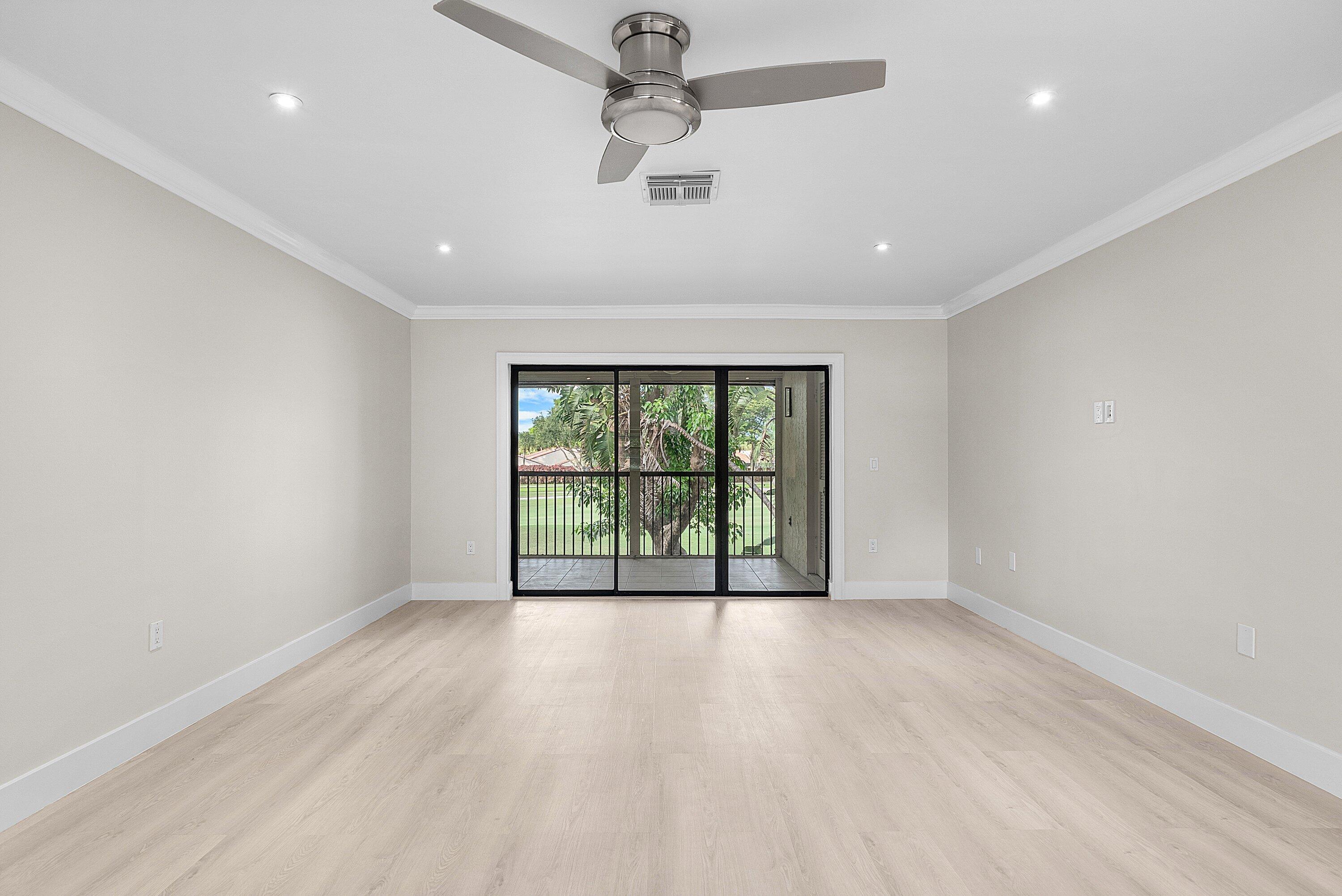 18 Stratford Drive East, Unit F Boynton Beach, FL 33436 - Photo 22 of 54 a view of an empty room with a window
