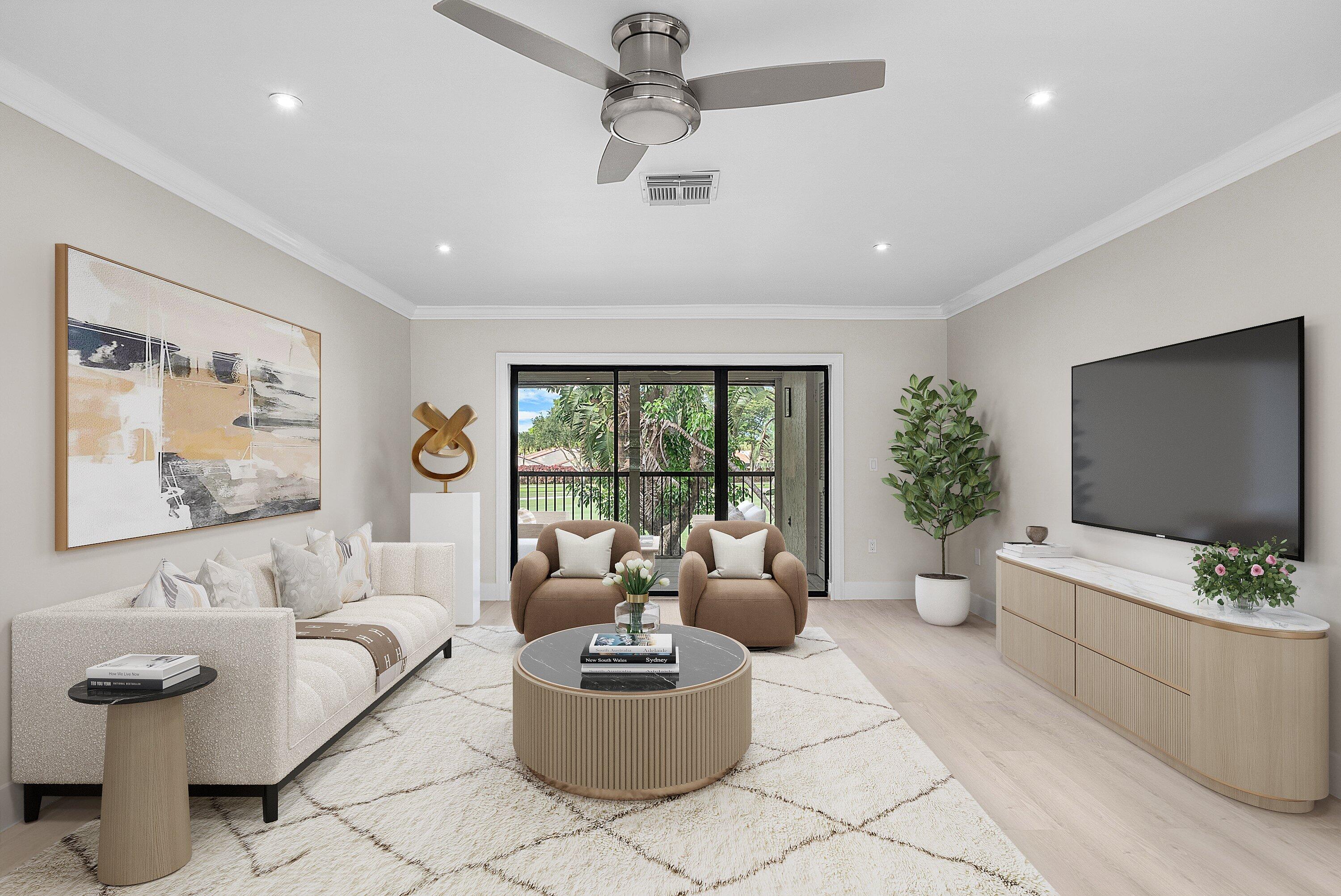 18 Stratford Drive East, Unit F Boynton Beach, FL 33436 - Photo 4 of 54 a living room with furniture and a large window
