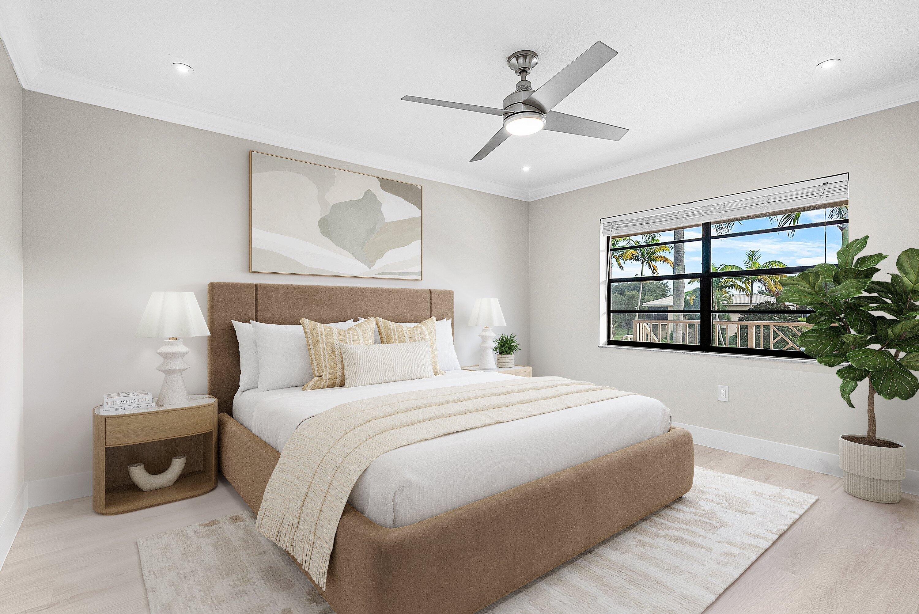 18 Stratford Drive East, Unit F Boynton Beach, FL 33436 - Photo 6 of 54 a bedroom with a large bed and a window