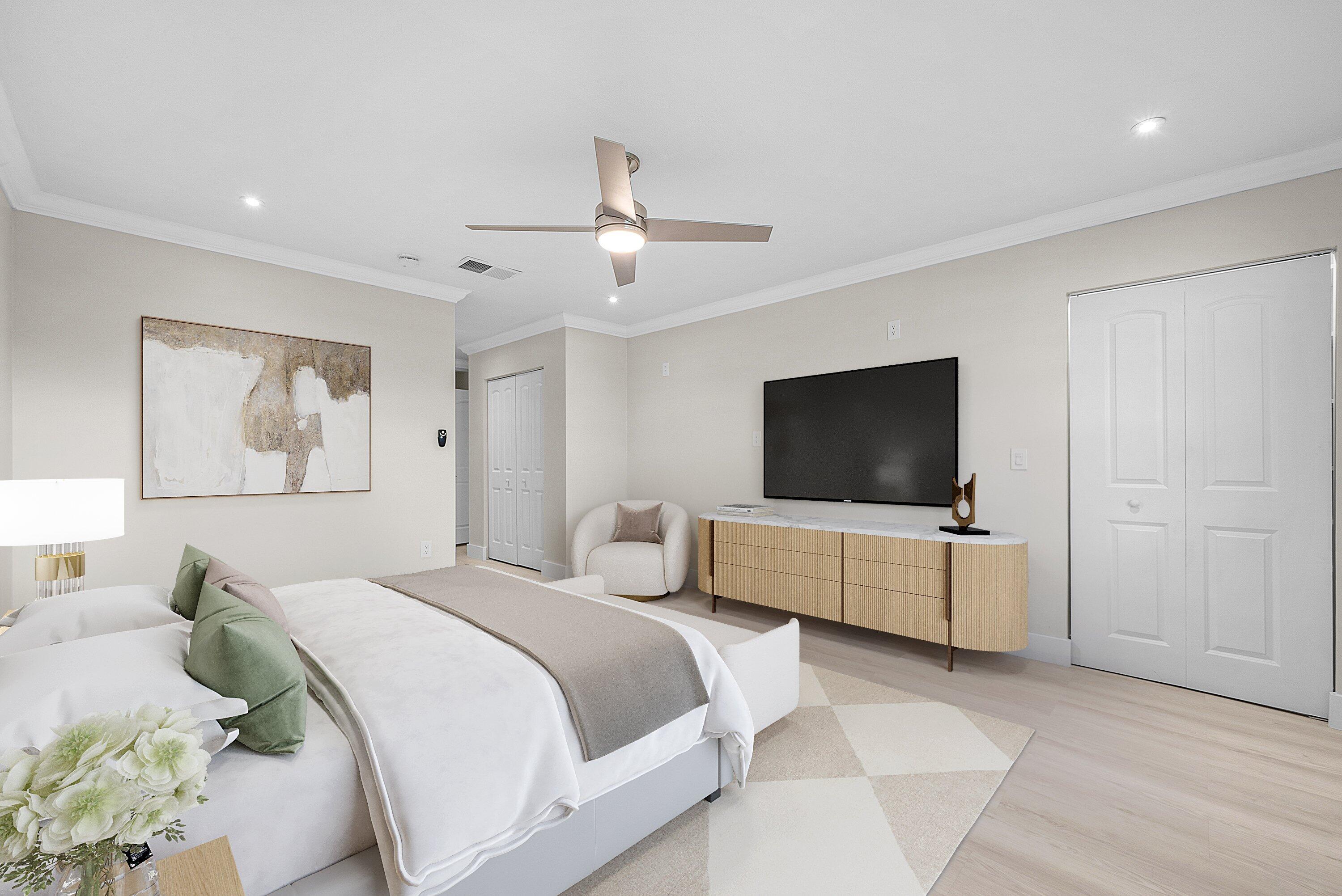 18 Stratford Drive East, Unit F Boynton Beach, FL 33436 - Photo 7 of 54 a bedroom with a bed and a flat screen tv