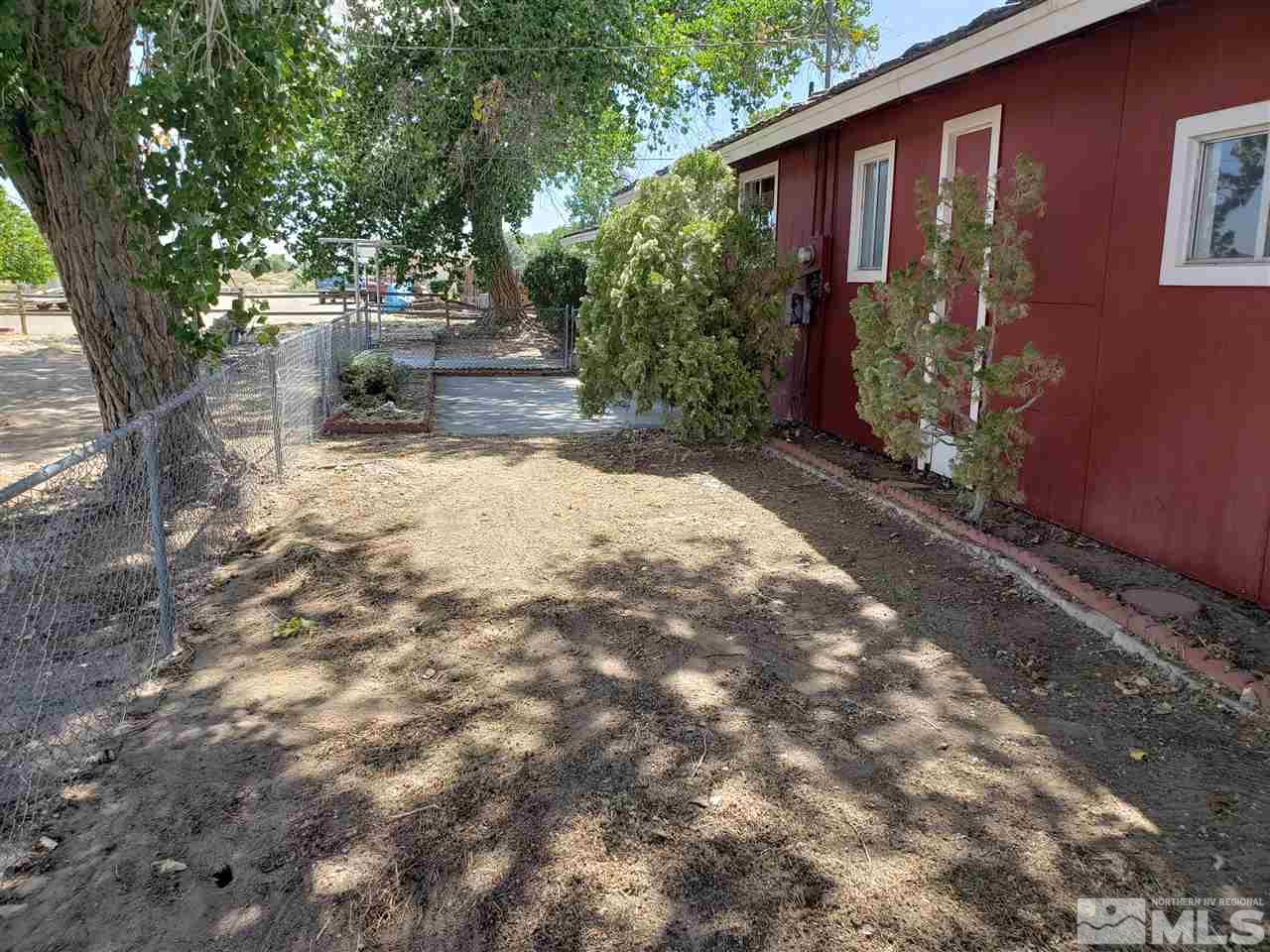 2355 Rice Road Fallon, NV 89406 - Photo 17 of 22 a front view of a house with garden