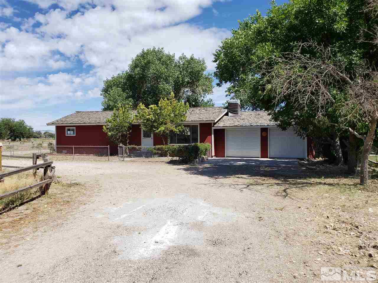 2355 Rice Road Fallon, NV 89406 - Photo 3 of 22 a view of a house with a yard and garage