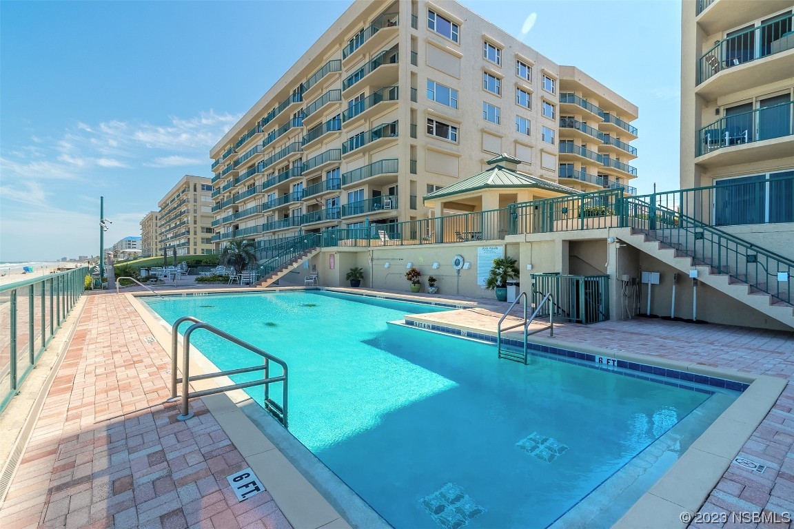 4545 South Atlantic Avenue, Unit 3204 Ponce Inlet, FL 32127 - Photo 14 of 58 a view of a building with a swimming pool