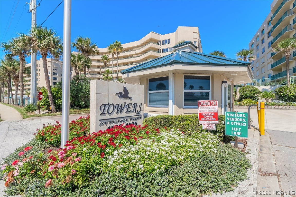 4545 South Atlantic Avenue, Unit 3204 Ponce Inlet, FL 32127 - Photo 3 of 58 a front view of house with sign board and yard