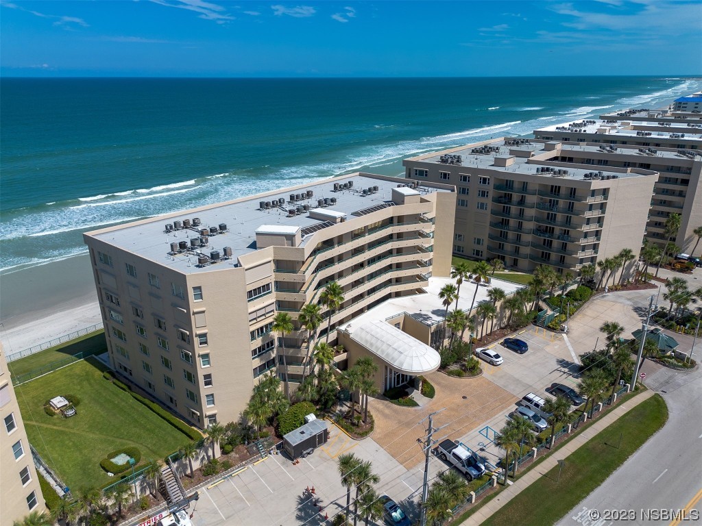 4545 South Atlantic Avenue, Unit 3204 Ponce Inlet, FL 32127 - Photo 53 of 58 an aerial view of a house with a garden