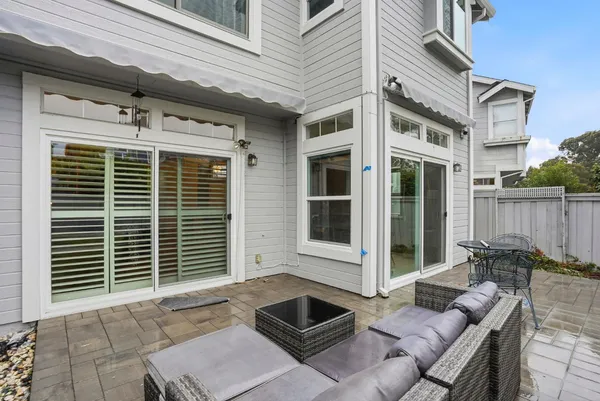 a view of a chairs in patio