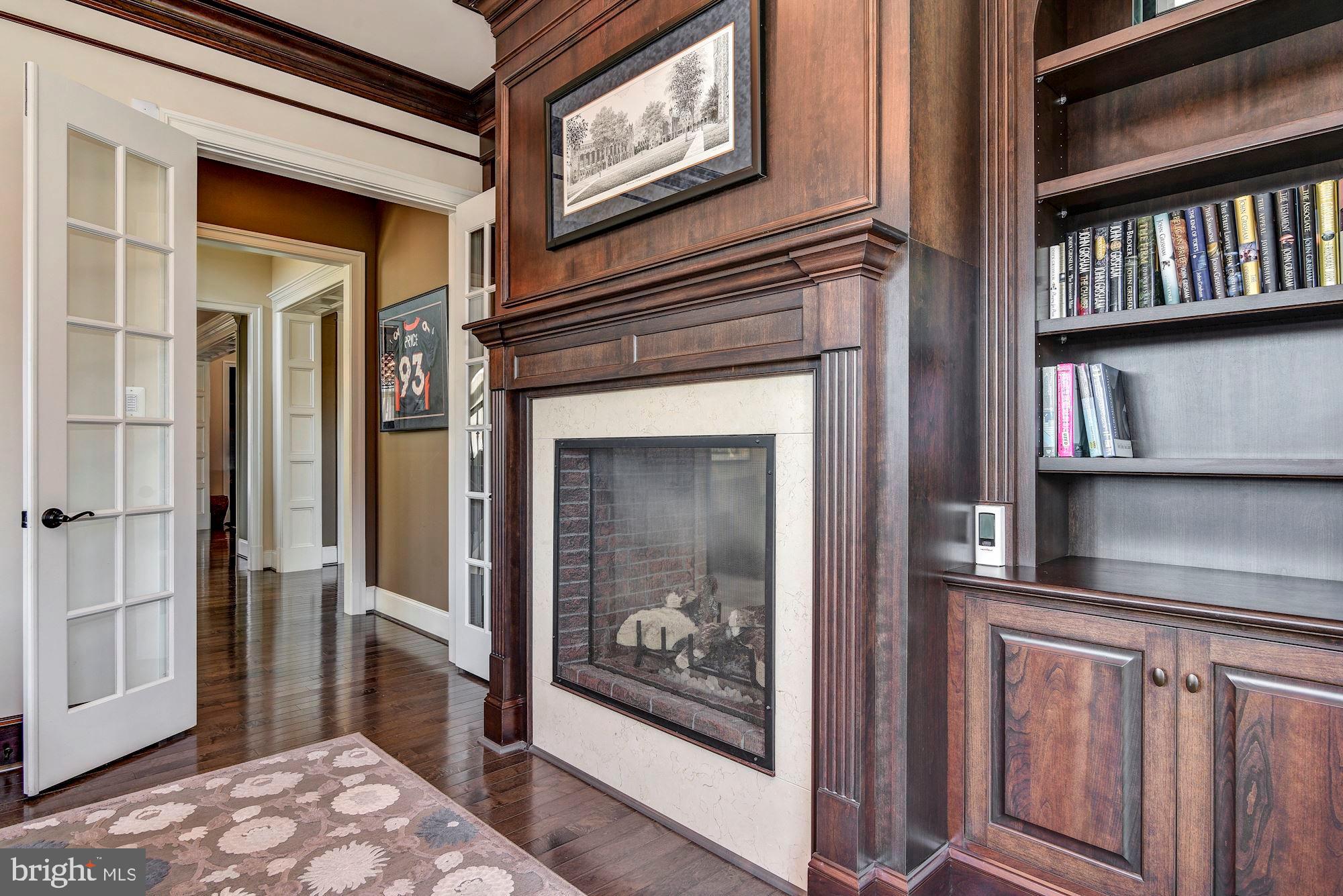 12057 Open Run Road Ellicott City, MD 21042 - Photo 14 of 91 Study, 2-Sided Fireplace and Library Built-ins