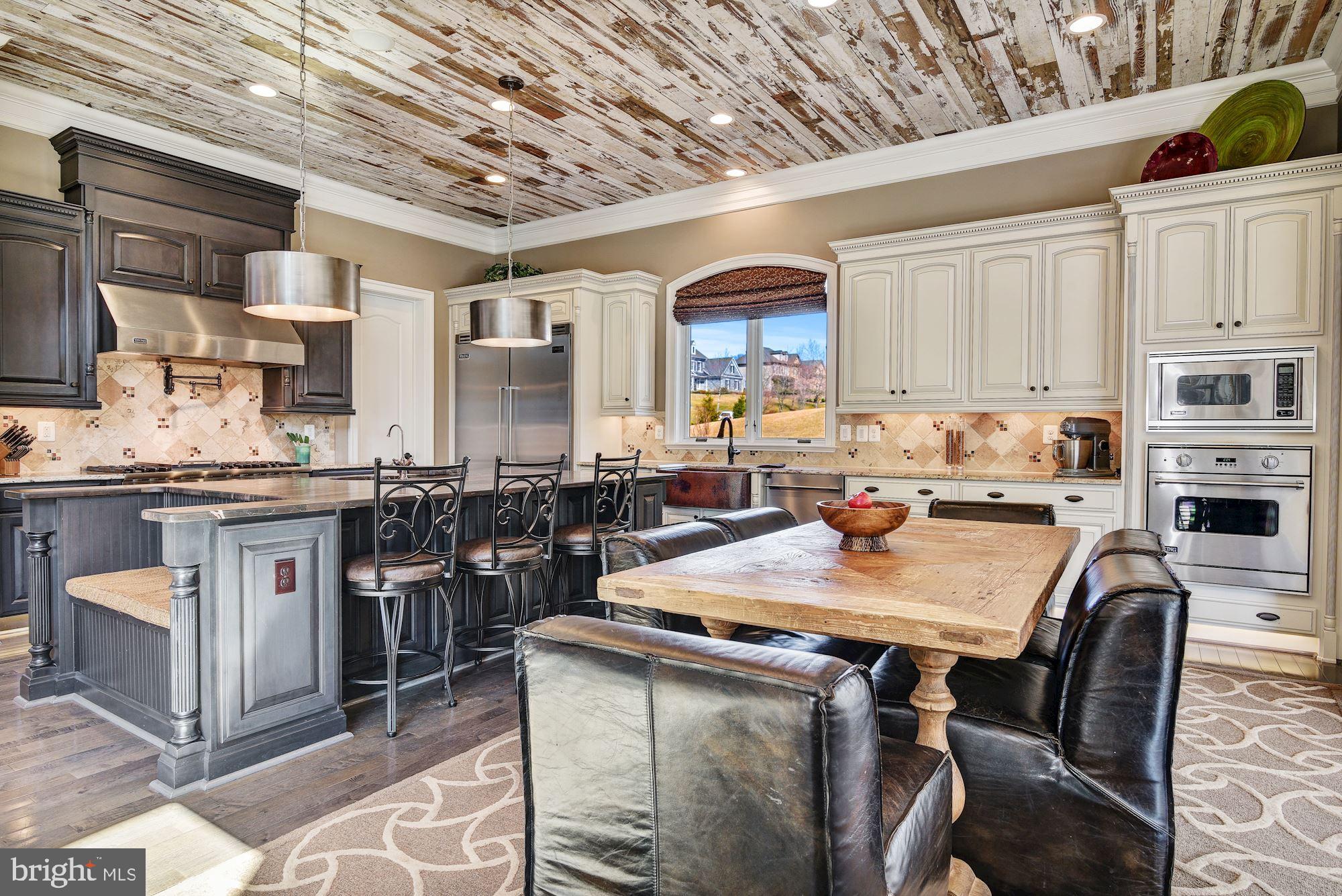 12057 Open Run Road Ellicott City, MD 21042 - Photo 23 of 91 Eat-in Kitchen with Central Island & Breakfast Bar