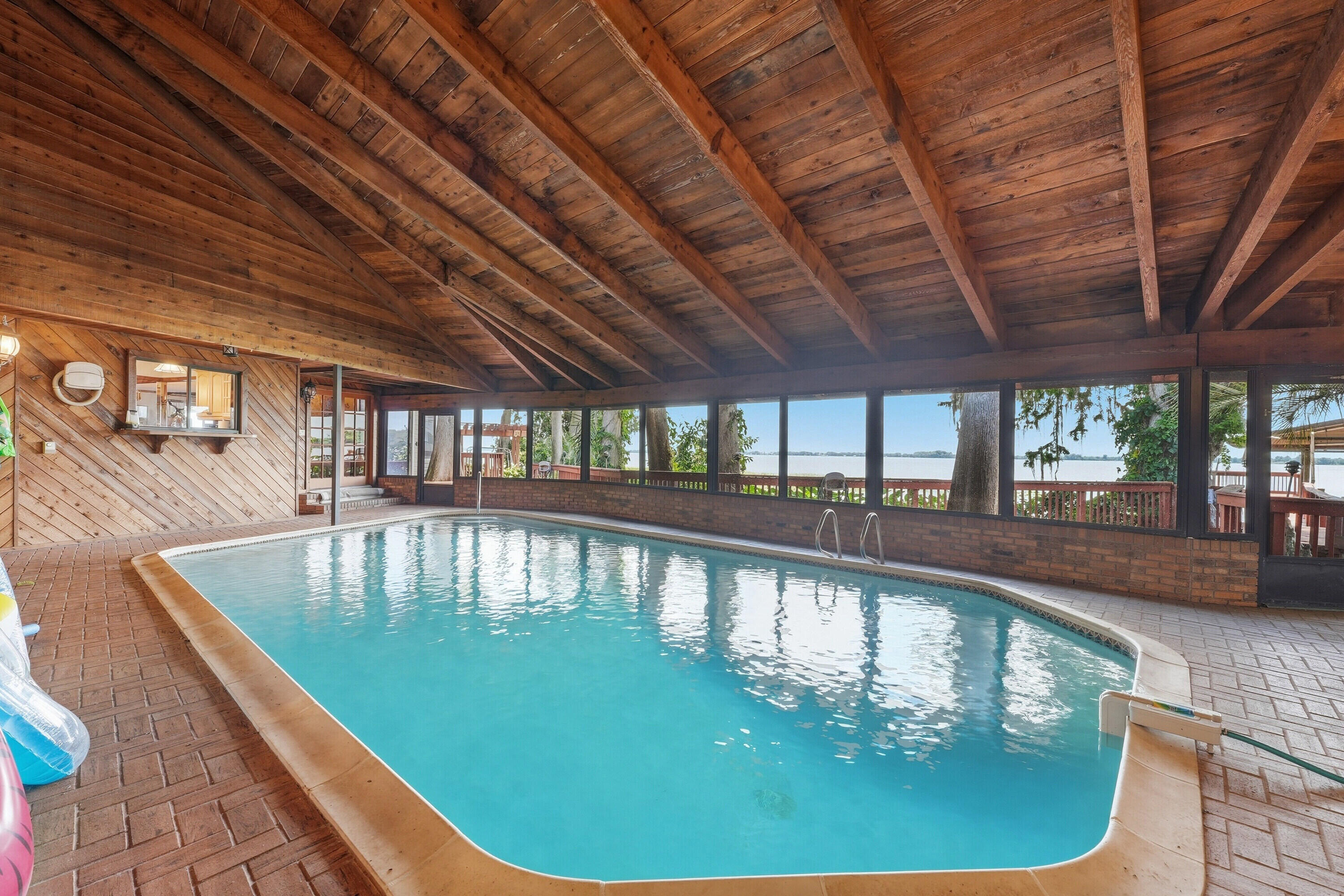 200 Windy Point Road Lake Placid, FL 33852 - Photo 41 of 74 a view of a swimming pool with a fountain