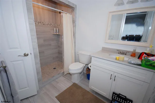 a utility room with sink dryer and washer