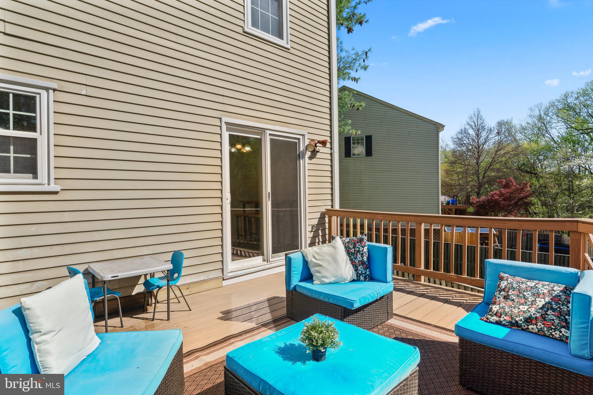10267 Green Holly Terrace Silver Spring, MD 20902 - Photo 18 of 52 a balcony with furniture and a potted plant