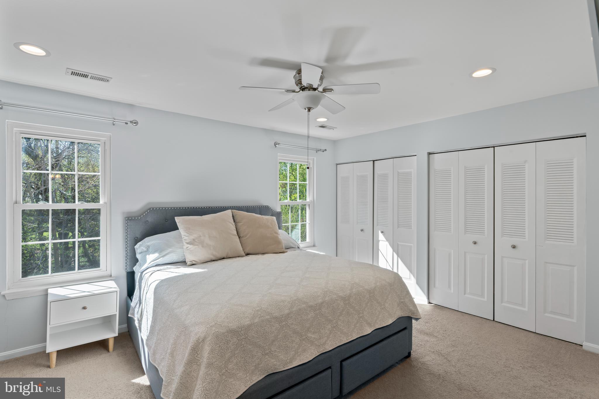 10267 Green Holly Terrace Silver Spring, MD 20902 - Photo 19 of 52 a bed room with a bed and a window