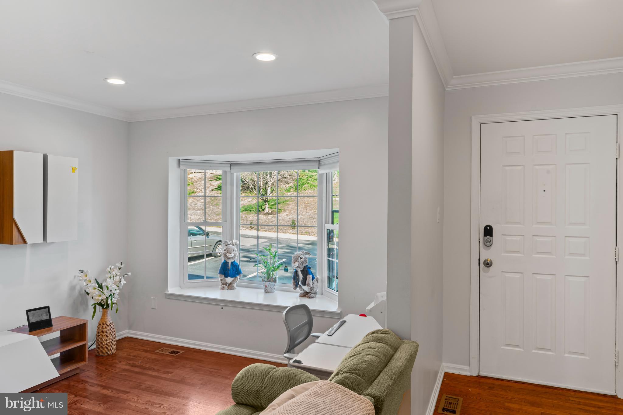 10267 Green Holly Terrace Silver Spring, MD 20902 - Photo 2 of 52 a living room with furniture and a window