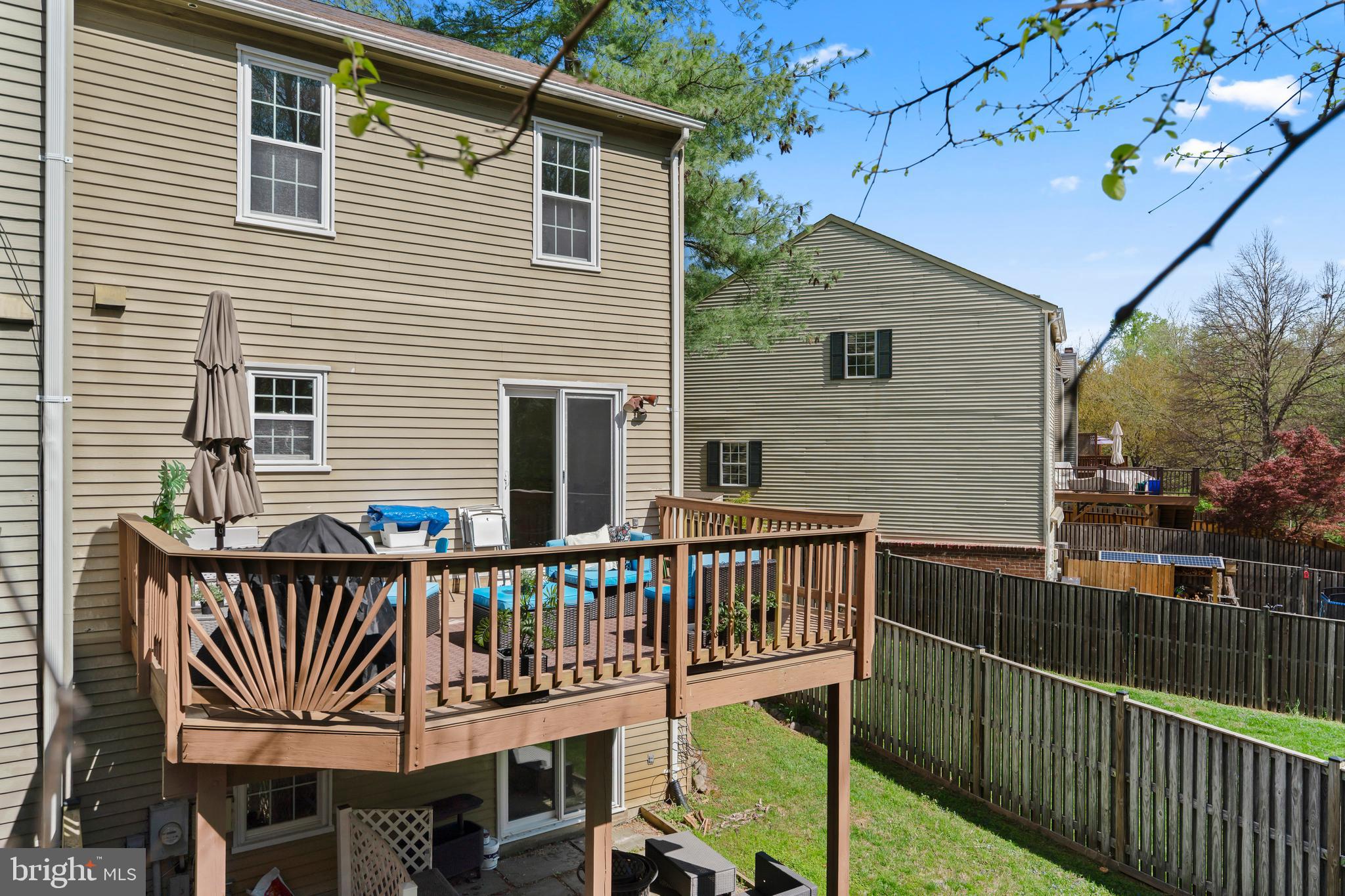 10267 Green Holly Terrace Silver Spring, MD 20902 - Photo 42 of 52 a view of a house with wooden deck