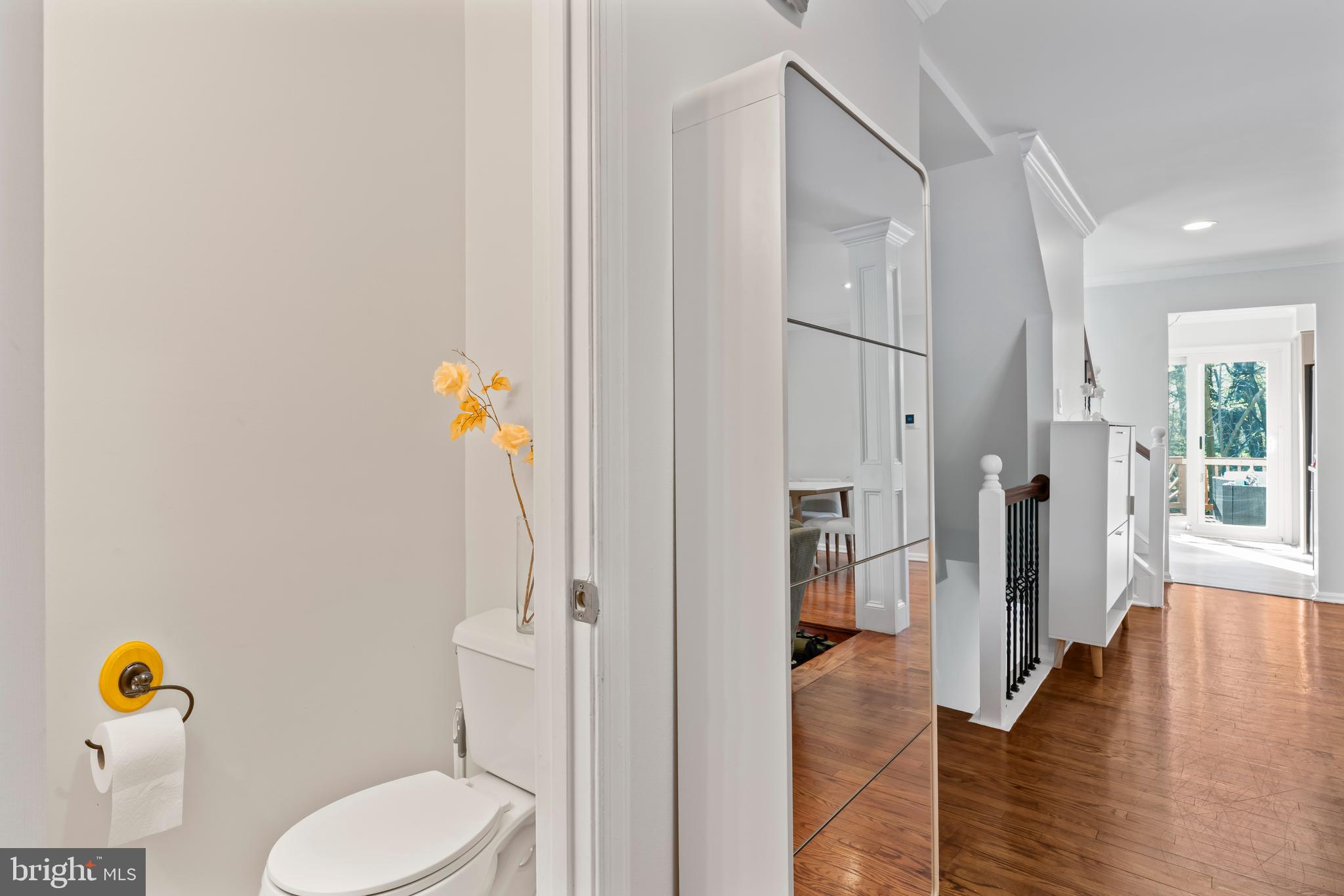 10267 Green Holly Terrace Silver Spring, MD 20902 - Photo 6 of 52 a bathroom with a toilet and a shower