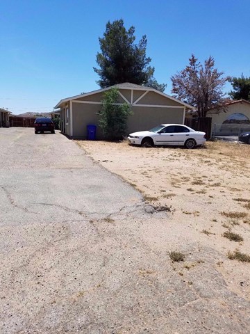 20425 Rimrock Road East Apple Valley, CA 92307 - Photo 1 of 1 a view of backyard of the house