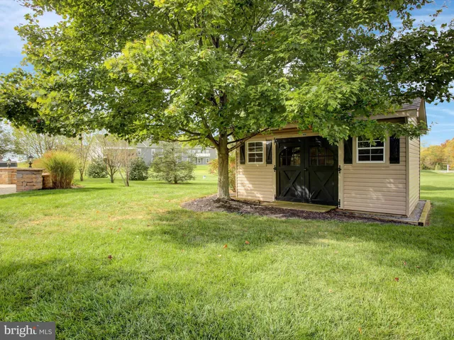 a vase of flowers sitting on a table