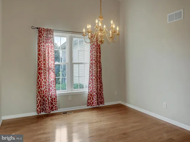 wooden floor in an empty room with wooden floor