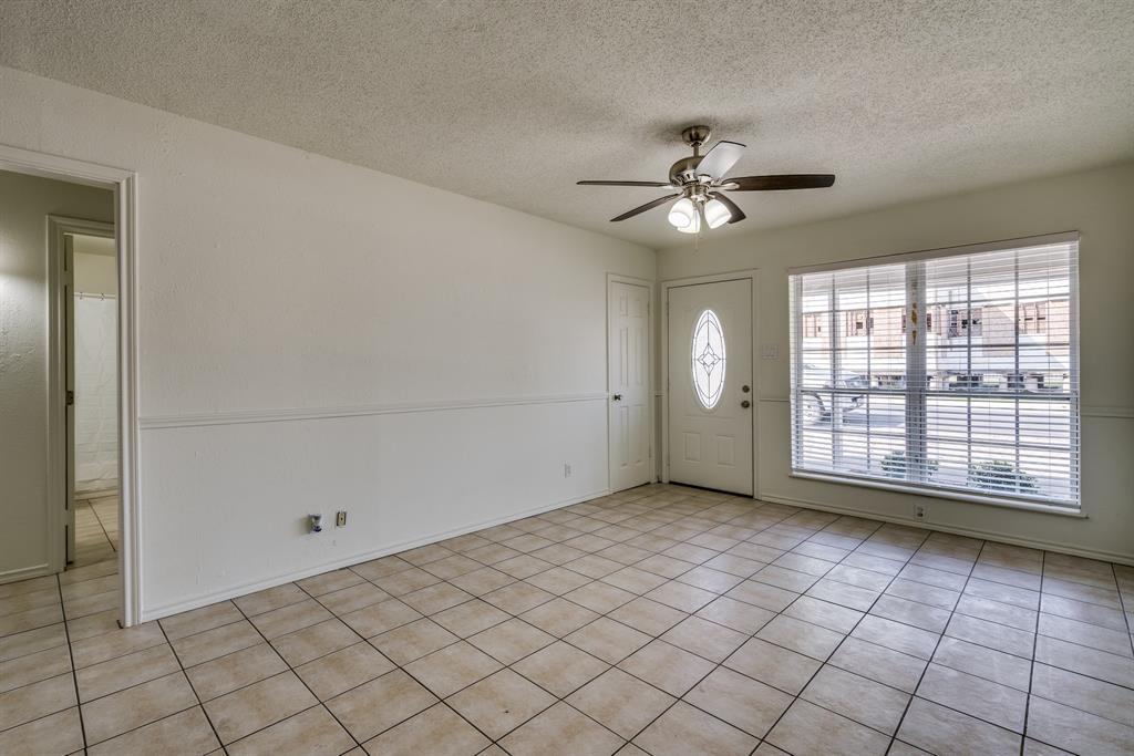 116 North 12th Street, Unit B Midlothian, TX 76065 - Photo 15 of 24 a view of an empty room with a window