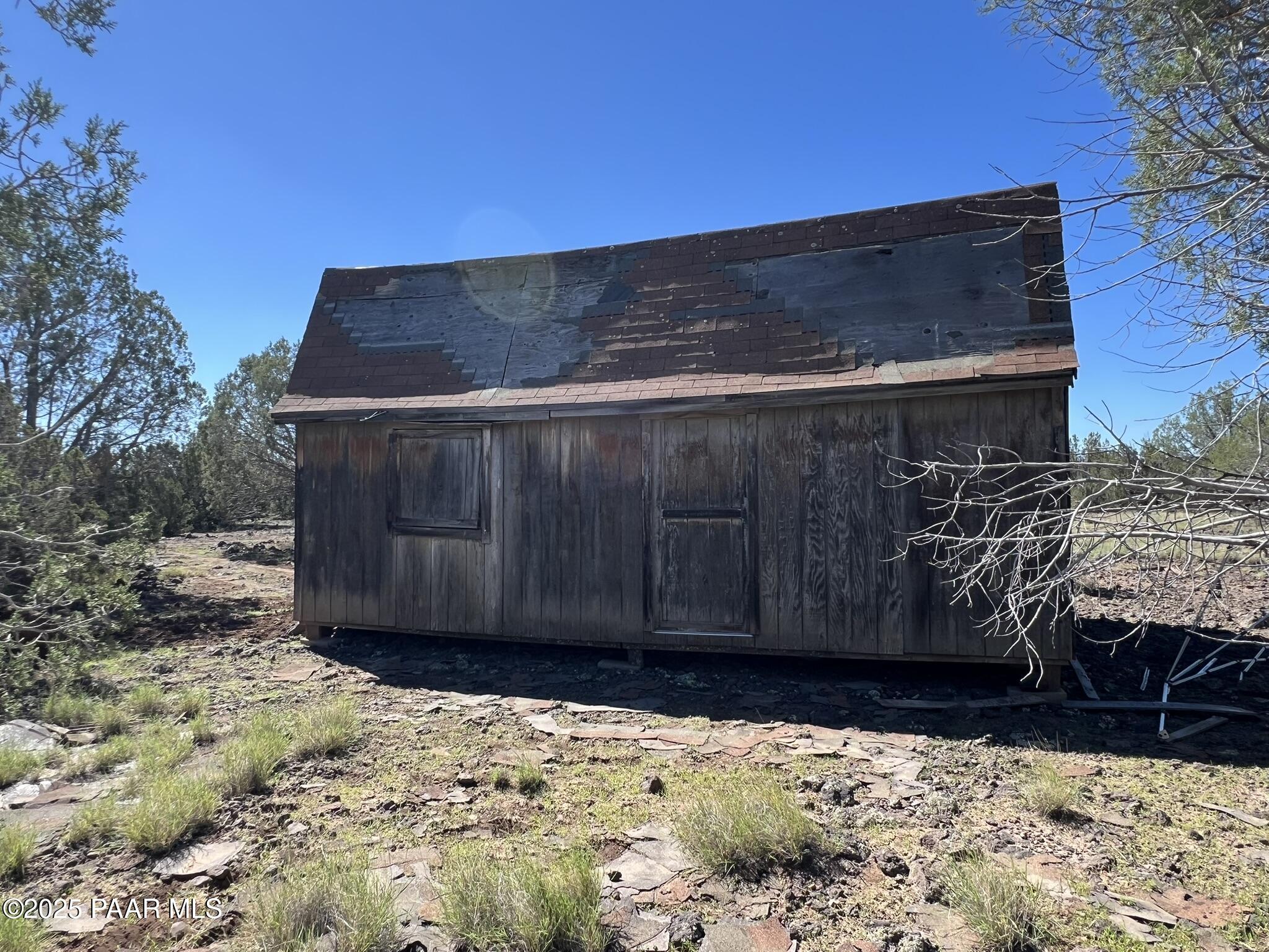 18 A West Warren Run Road Ash Fork, AZ 86320 - Photo 4 of 17 a view of a wooden fence
