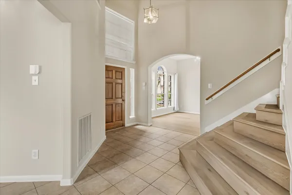 a view of entryway with wooden floor