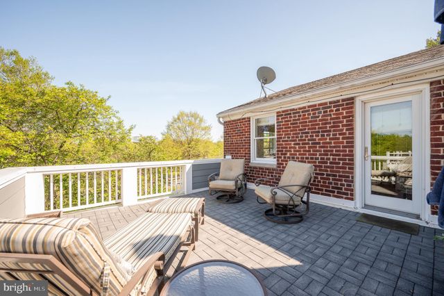 a view of a two chair in the balcony
