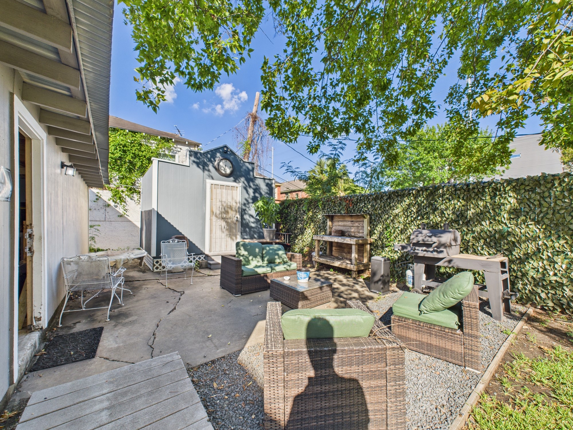 1920 Richmond Avenue, Unit 6 Houston, TX 77098 - Photo 17 of 21 a view of outdoor space yard deck patio and outdoor seating