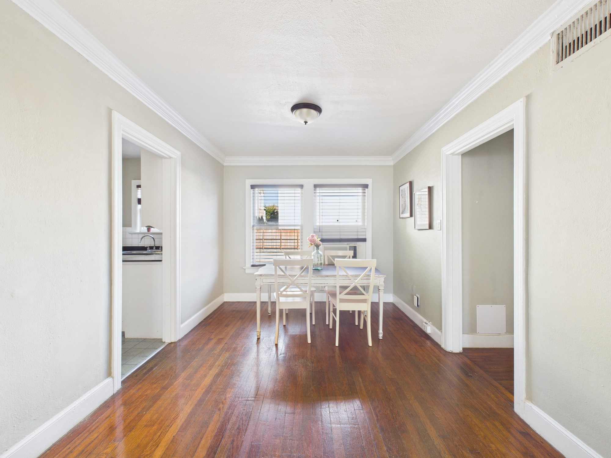 1920 Richmond Avenue, Unit 6 Houston, TX 77098 - Photo 5 of 21 a view of a dining room with furniture and wooden floor