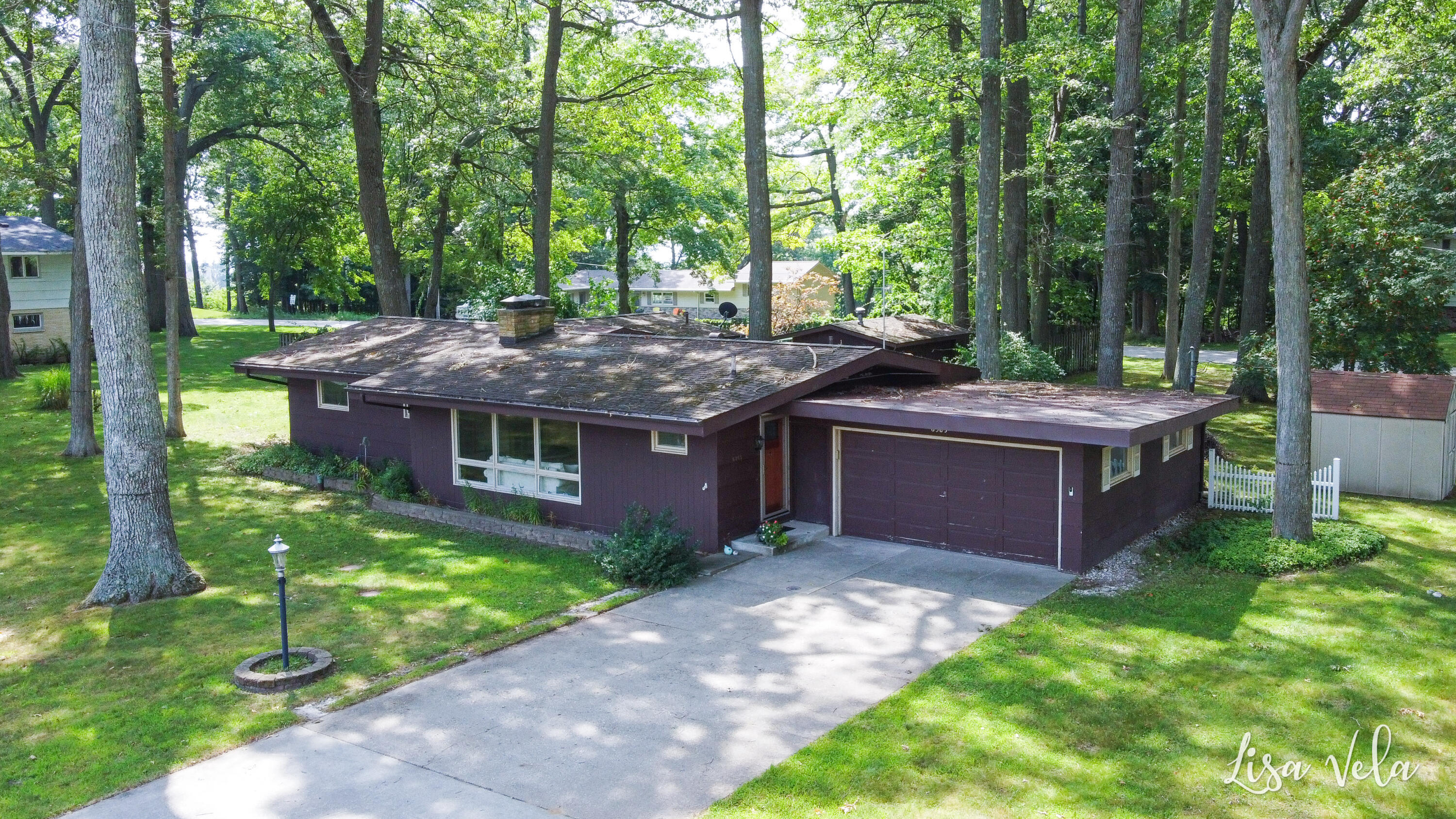 6365 Indian Point Road Montague, MI 49437 - Photo 1 of 39 Exterior - Front