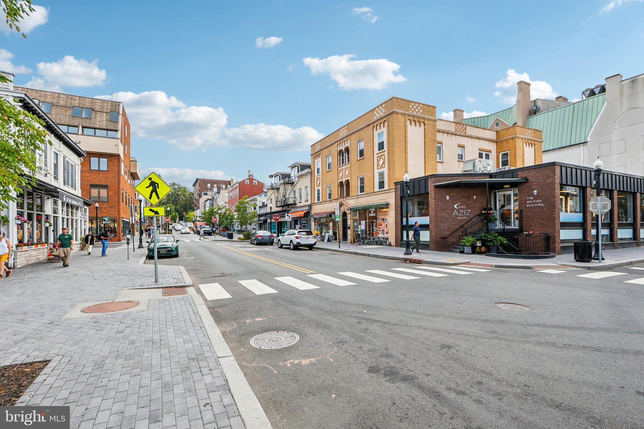 31 Palmer Square East, Unit A Princeton, NJ 08542 - Photo 35 of 40 a city street lined with buildings and cars