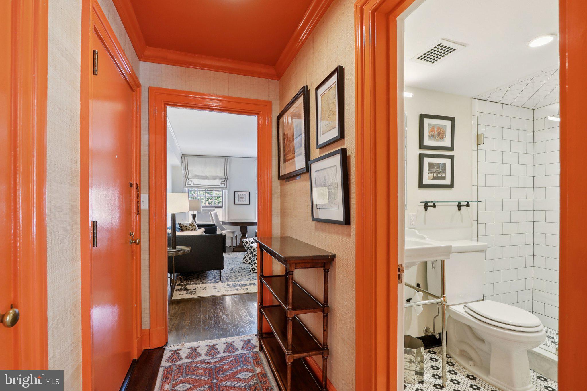 31 Palmer Square East, Unit A Princeton, NJ 08542 - Photo 6 of 40 a bathroom with a toilet a sink and a large mirror