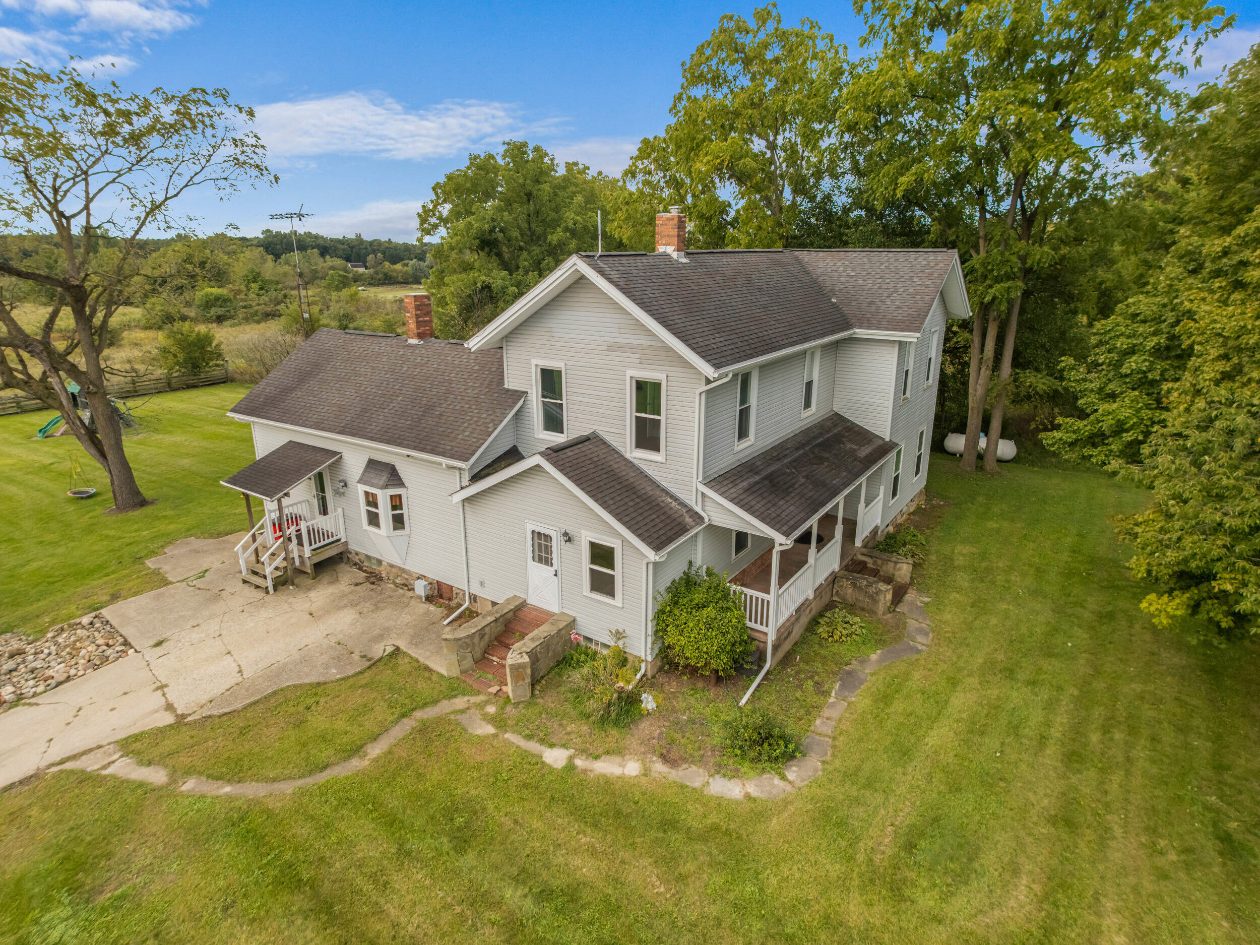 3771 Reading Road East Osseo, MI 49266 - Photo 2 of 65 6_dji_20260925104047_0385_d