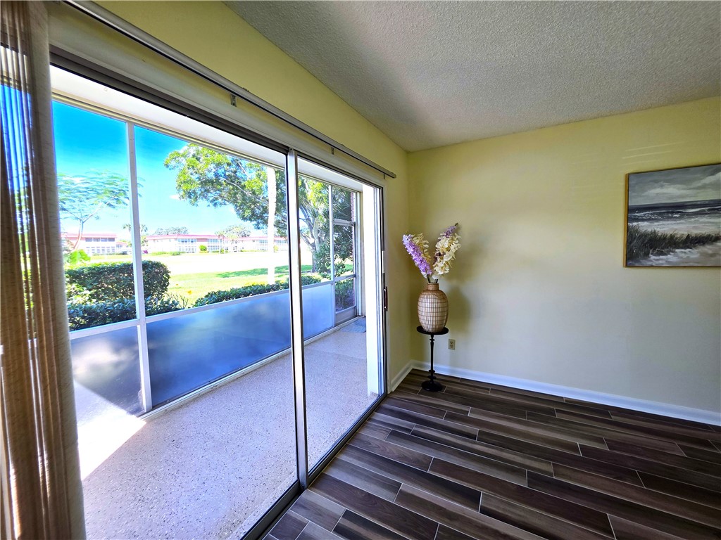 88 Crooked Tree Lane, Unit 107 Vero Beach, FL 32962 - Photo 17 of 33 a living room with furniture